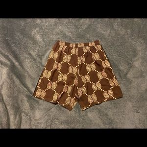 Collect and Select Baseline Brown Paisley shorts.